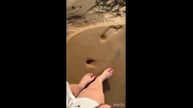 feet in the sand