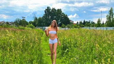 Barefoot in the warm summer grass