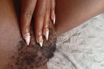 Pretty nails on a pretty afro bush