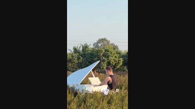 Playing the piano in the field :)