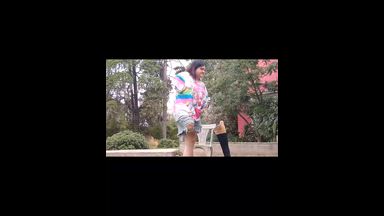 Hopping in a park outside and stump playing