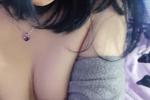 Squeezing breasts