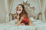 sucking a lollipop