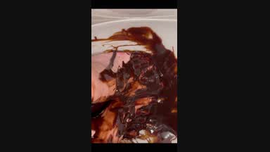 Chocolate syrup dripping off toes