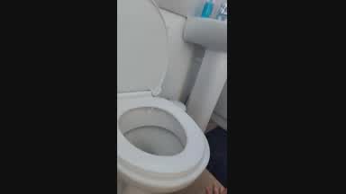 Licking the toilet clean