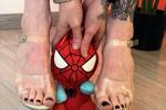 my sexy legs in heels torturing spiderman ;)