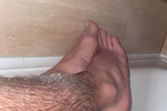 My wet legs in the bathroom