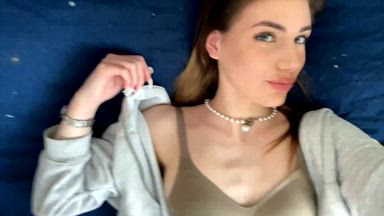 I'm lying on my back, teasing you with my face