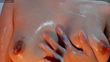 oiled and creamy breasts