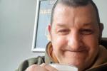 me in pub with a pint of beer