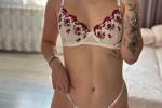 A steamy photo of white lace lingerie