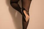 at the feet of a sexy secretary