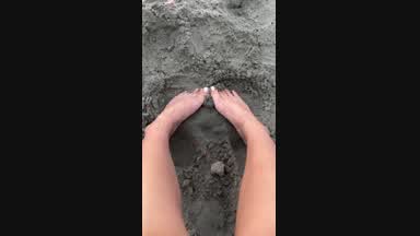 feet in the sand
