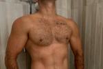 Hairy man in the shower