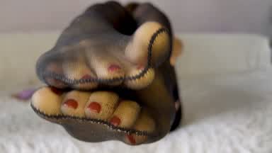 Black stockings feet teasing