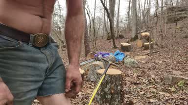 Playing lumberjack in my daisy dukes and Boots
