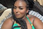 Naked on a balcony