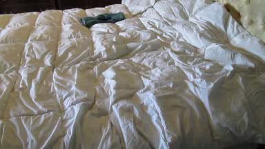 White leather TV slut cums on bed