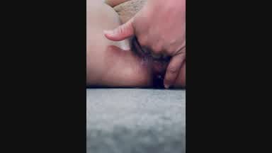 Masturbating