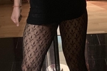 short black skirt n black fishnets