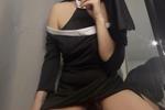 “Naughty Nun” cosplay with a big black dildo