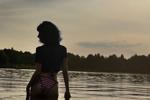 Relaxing on the lake in a cute swimsuit!