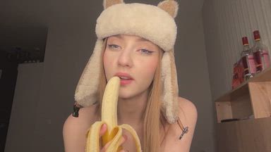 gently eating a banana