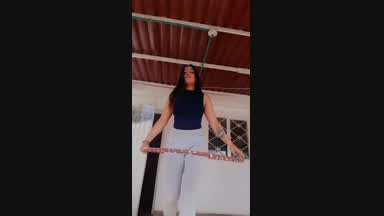 PLAYING HULA HOOP